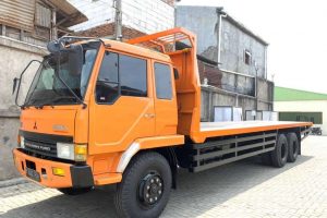 jasa pengiriman barang ekspedisi sewa truck fuso tronton los bak untuk dalam kota/luar kota
